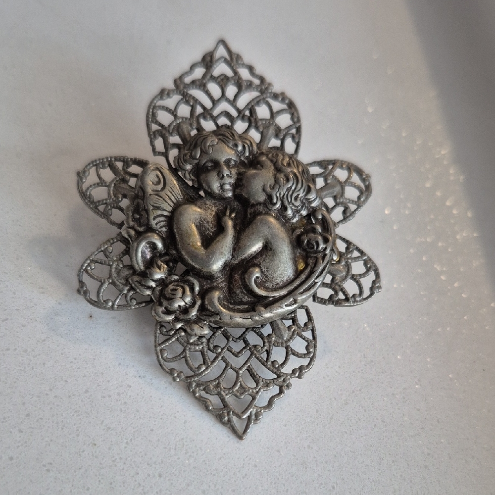Intricate Silver Cherub Brooch